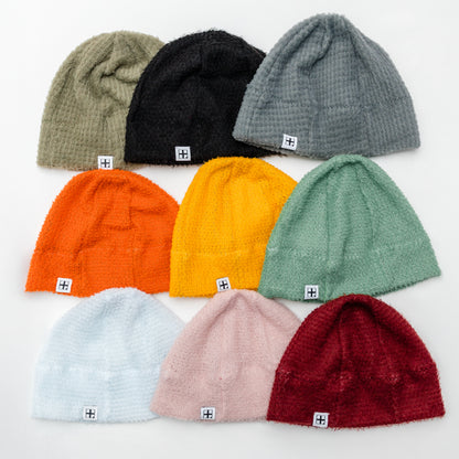 Alpha Direct Ultralight Beanies displayed on a white background, including colors such as black, gray, orange, yellow, green, pink, and red.